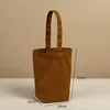 Brown bucket bag with bottom and no side20*22*10cm