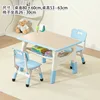 A table and two chairs in a wood-grain whale blue color.