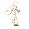 Porte-clés petit papillon doré-G
