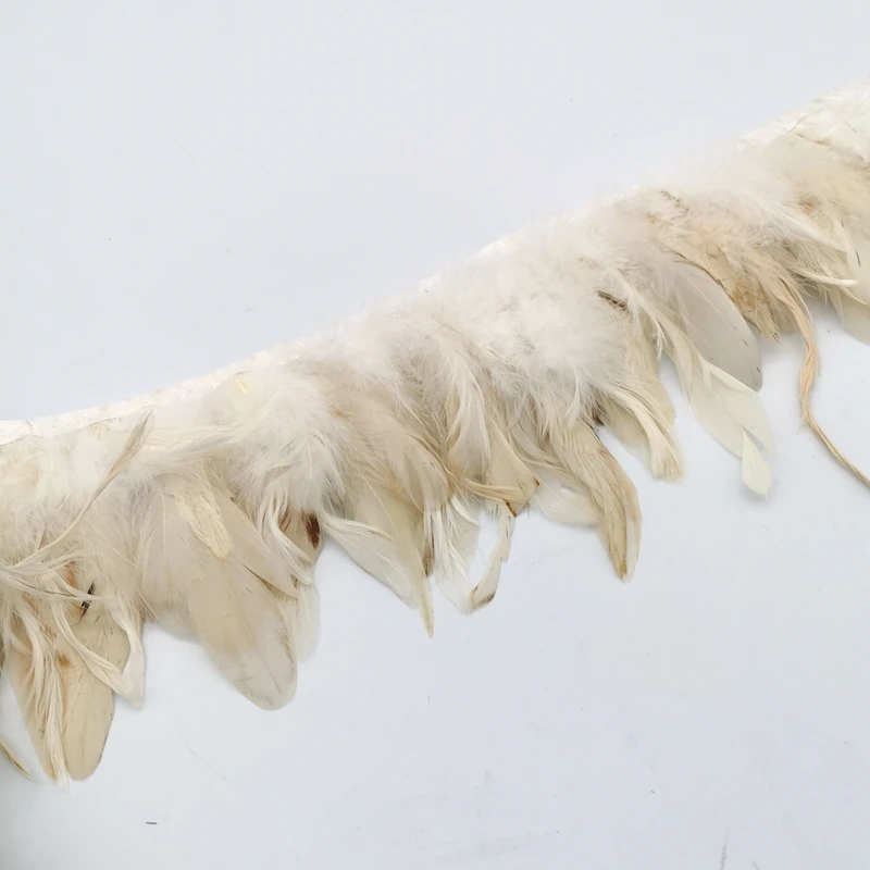 批发用于连衣裙装饰的天然白色公鸡羽毛面料