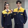 Yellow top and navy blue bottom suit