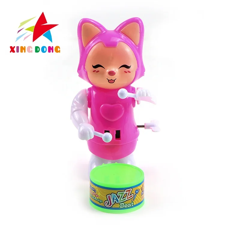 Wholesale custom wind up toys cute mini cartoon boy beat a drum