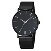 Black dial, black strap and silver pointer
