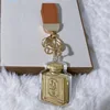 Perfume bottle (containing 20mg of gold - orange cord)