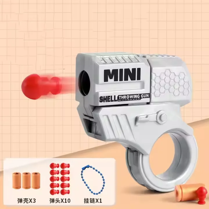New Decompression Fidget Spinner Toy Mini Soft Bullet Shell Ejecting Plastic Toy Gun for Boys
