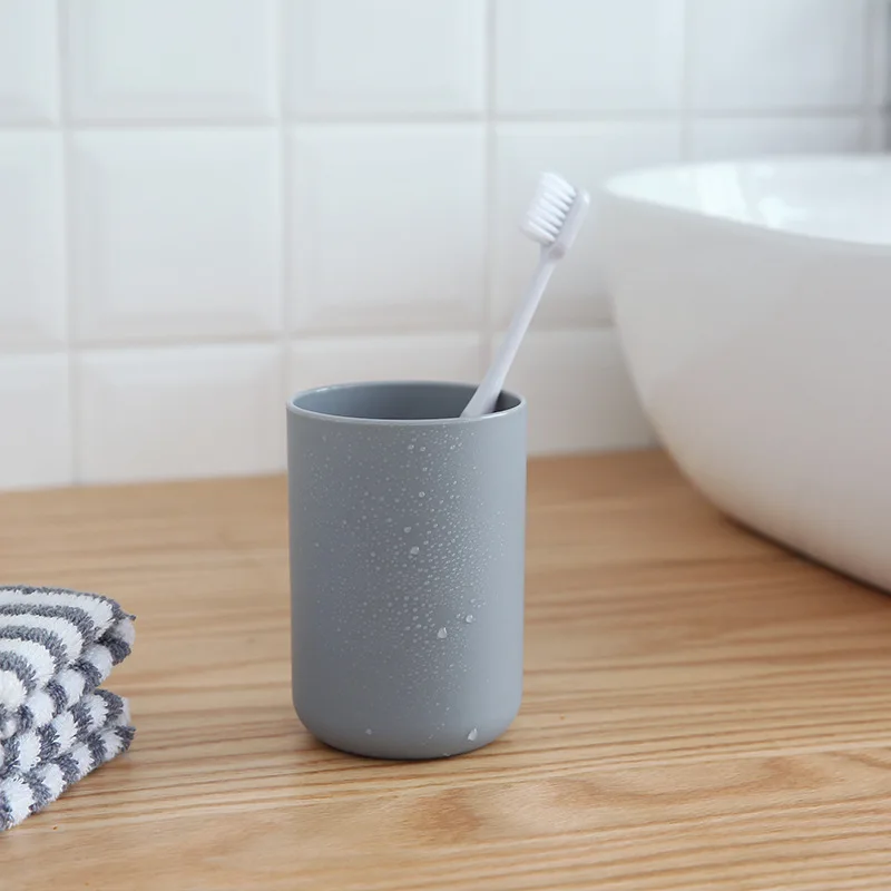 Wash cup with toothbrush holder Brush cup Household plastic simple creative wall-mounted wash shelf toothbrush cup manufacture