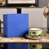 Yellow cup and saucer