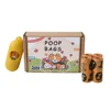 Dispensador de 5 rollos con forma de hueso, aroma naranja + lavanda.