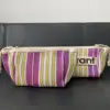 Pajita a rayas amarillas, blancas y moradas (bolsa de cosméticos)
