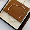 05-i11Gold  beaded necklace