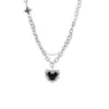 Collana con doppia croce e spine nere