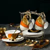 C-4 tasses, 4 plats, 4 cuillères + porte-tasses