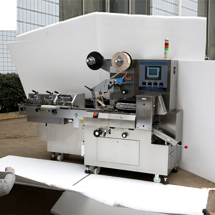 Pillow Type Automatic Napkin Sanitary Pad Baby Diaper Packing Machine