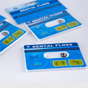 Daily Care FDA CE Approved OEM Accept Portable Card Shape 40M Mint Flavor Waxed 630D Nylon Dental Floss with Mirror Back