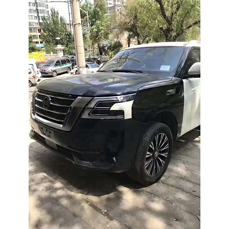 High Quality PP Material Body Kit for Nissan Patrol Y61 Old to New Parts with Headlight Taillights Hood Fender Front Rear Bumper
