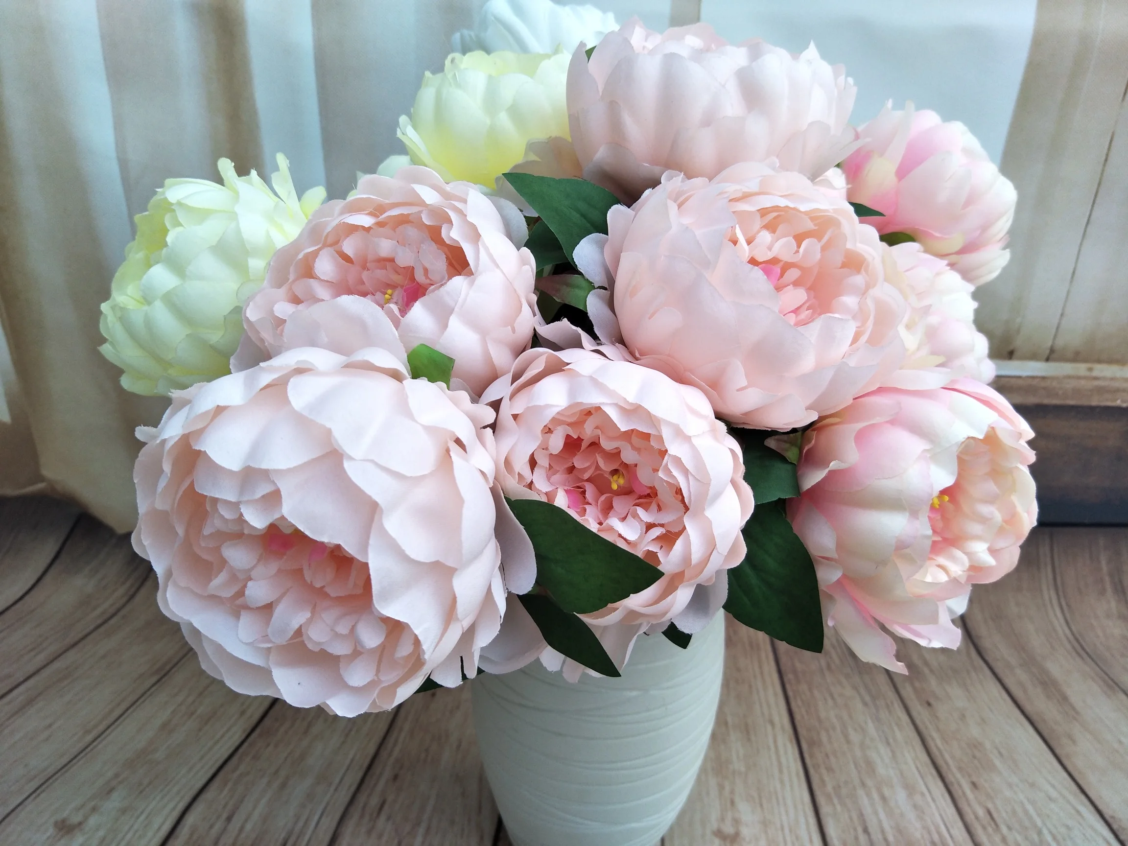 Bulk up on red artificial roses for weddings, events, and more