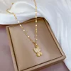 Colgante de cobre con cadena de acero titanio F112