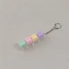 4 clés violet jaune rose vert