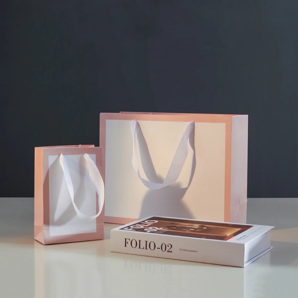 Custom Your Own Logo Printed Recyclable Luxury Paper Bags Packaging Clothing Shopping Paper Bag With White Ribbon Handle