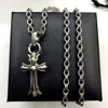Double-layered cross with alphabet chain