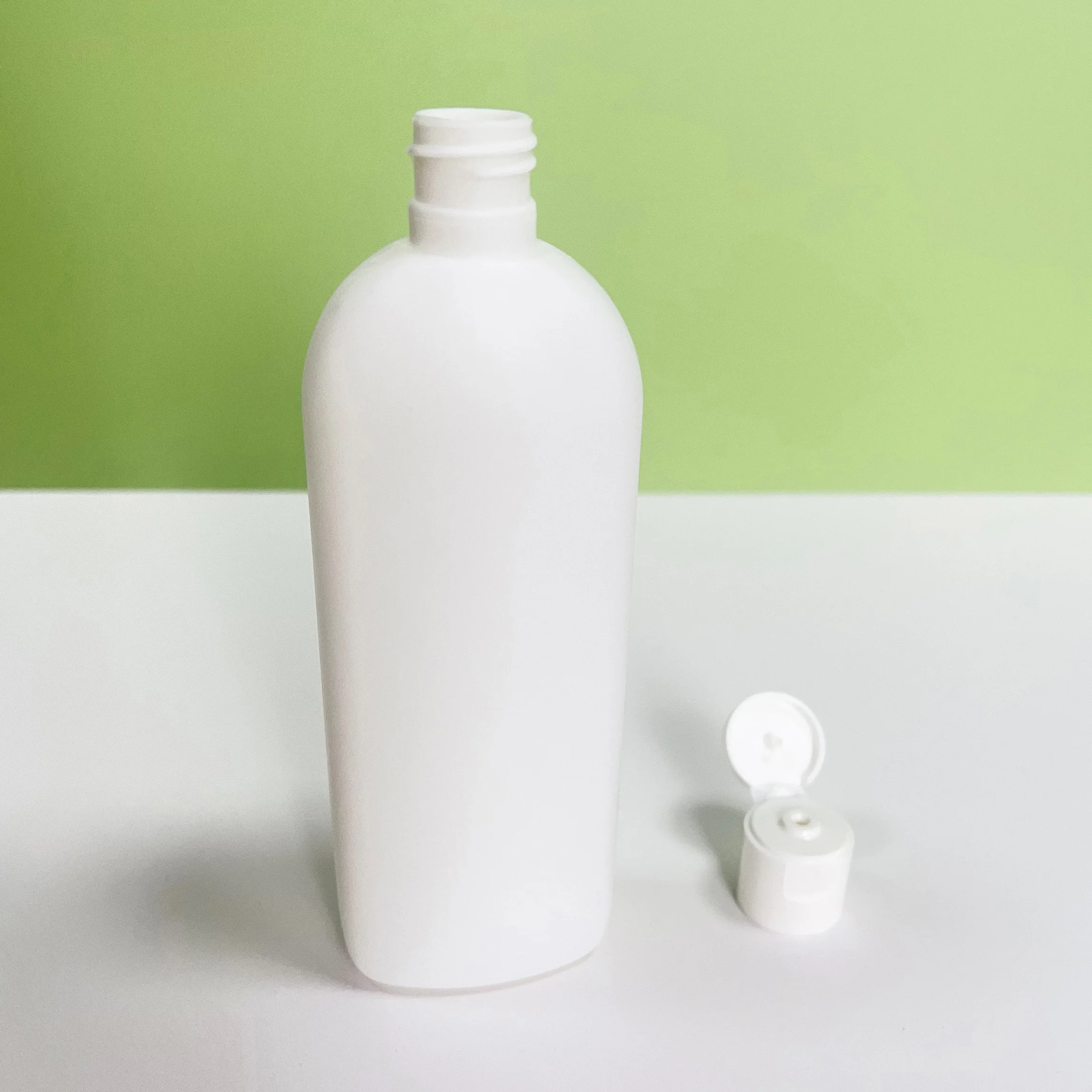 New Product 200ml HDPE Material Lotion Conditioner Body Milk Round Shoulder Flat Bottle