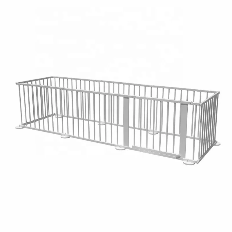 white wooden playpen
