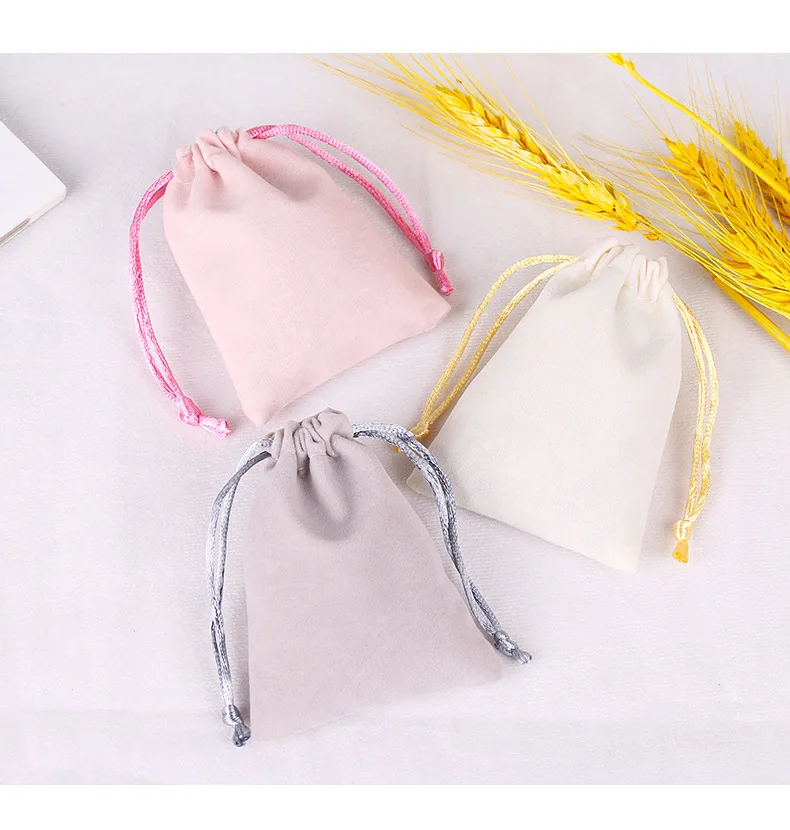 Brand Enhancement Through Packaging Branded velvet bag enhancing product presentation