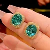 Platinum Parra green ear studs