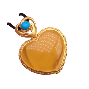 Heart-shaped gold plated amber pendant