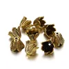 Grand porte-fleurs en alliage d'or antique style trois