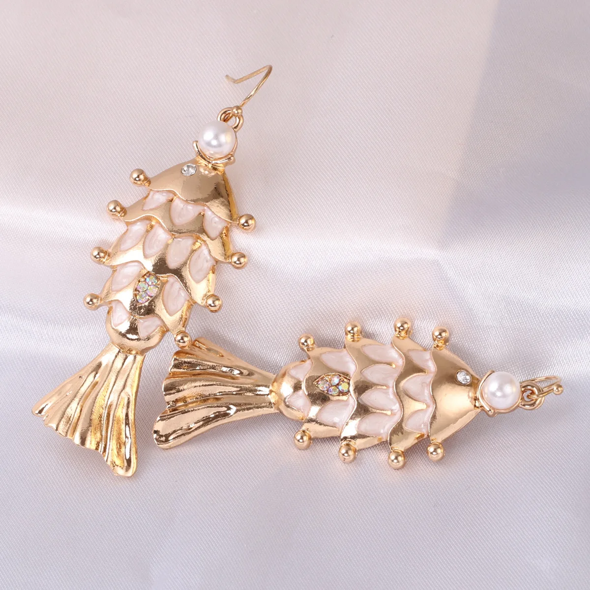 Dress your Navratri up with our effortlessly stylish Silver Gold Plated Fish  Pearl Earrings … | Gold jewelry fashion, Jewelry design earrings, Gold  earrings designs