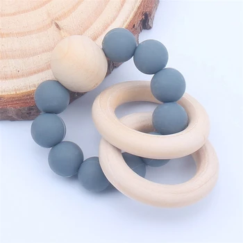 16 Design Wholesale High Quality Cheap Baby Teether Silicone Chewable Toy Wooden Baby Teether Teething Bracelet Ring Teether