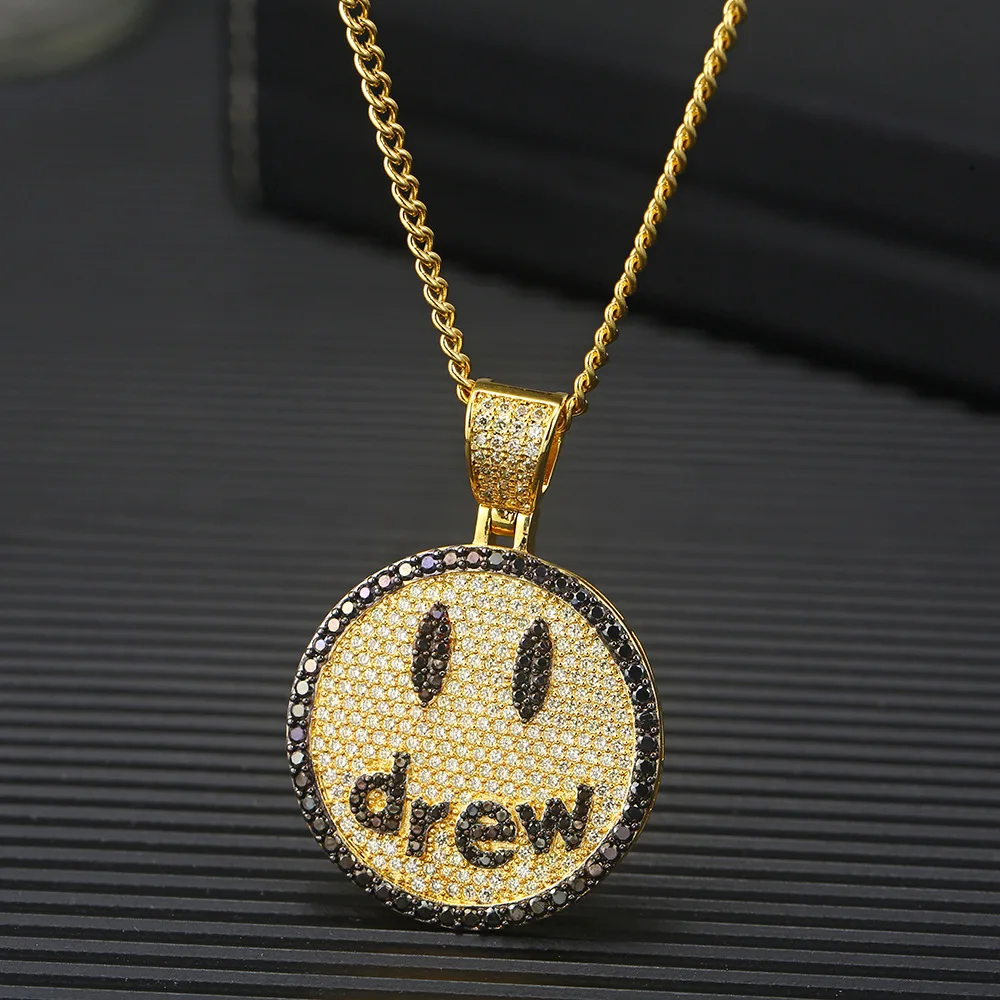 iced out smiley face pendant