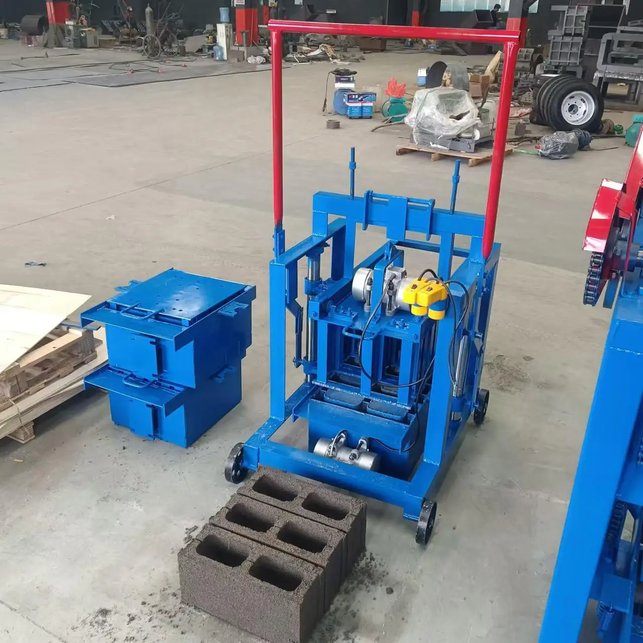 Egg Laying Mobile Manual Brick Machine Concrete Cement Brick Making Machine Small Hollow Block Making Machine for Sale in USA