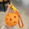 Orange-shaped ball with rubber buckle-orange cord