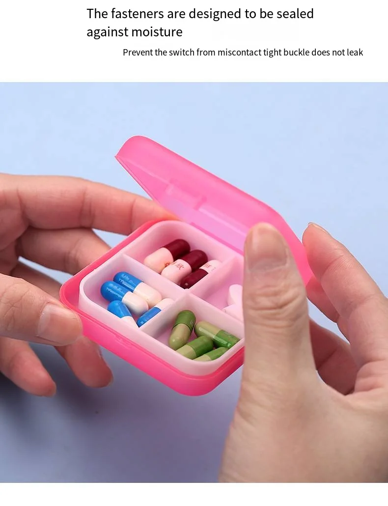 Creative cross four cell pill box convenient travel mini plastic pill box pill storage factory