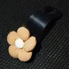 Orange flower [black hook]