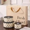 Cream-colored polka dot food storage bowl set of three