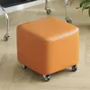 Orange chair without backrest