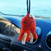 Pulpo rojo con cara sonriente