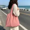 Gilet a pois rosa