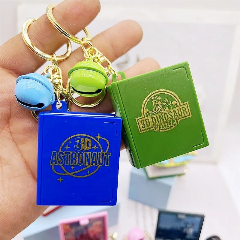 Factory Direct Novelty 3D Mini Book Key Chain Portable Folding Mini Surprise Exploding Books Toys Key Chain for Kids
