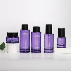 Wholesale 30g 50g 30ml 50ml 100ml Cosmetic Translucent Green Glass Jar Sets Flat Shape Face Cream Lotion Bottle for Skincare