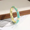 Hd-056 light gold quicksand-emerald green-pink flowers