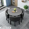 Mesa redonda gris + silla de cuero negro