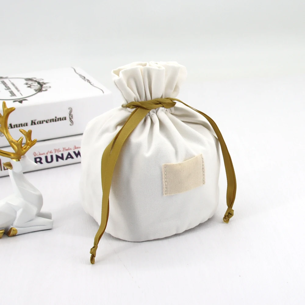 Tilpasset logo Miljøvennlig sekk med snorer Tilpasset logo emballasje Bomullssekker Sekk av lerretstoff Støvbeskyttelses gavepose til kosmetikk