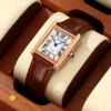Rose gold case with brown trim