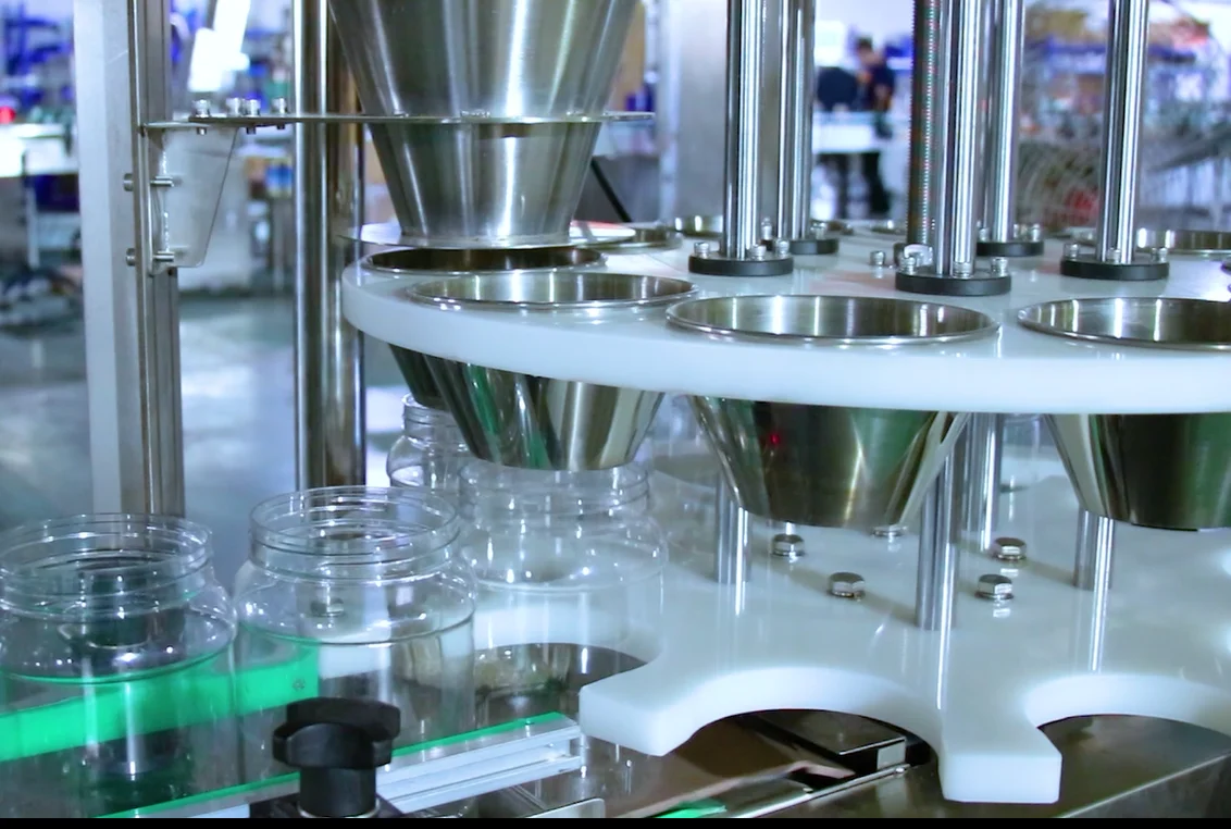 Turntable Type Granule Feeding Filling Machine Production Line Nut and Soybean Pellet Feeder