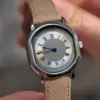 Ceinture marron avec plaque argentée