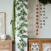 Champagne-colored French rose vine, 2.2 meters long, with branches.